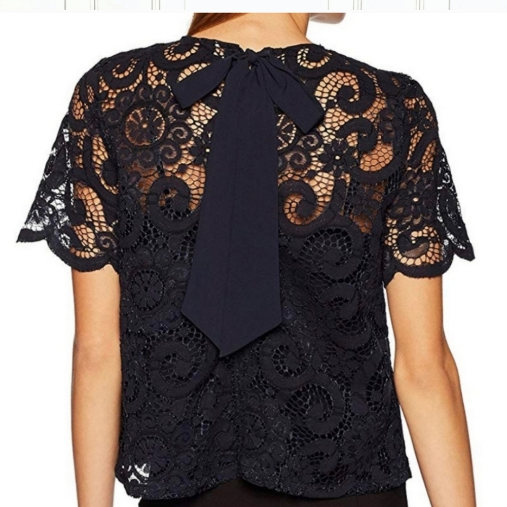 Black lace, bow in back, short sleeved box top